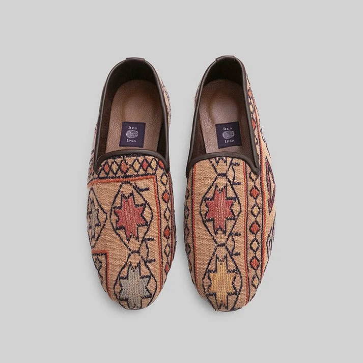 Men's loafers in a neutral color like black or brownMen's Kilim Loafer Size 9