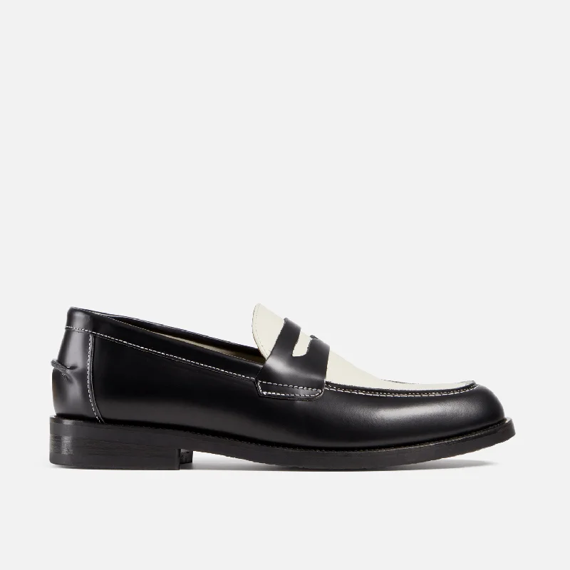 Men's loafers with a stretchy side panel for a better fitWilde Black + White Penny Loafer - Men's