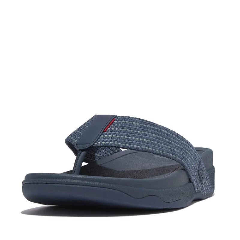 Men's sandals with a perforated leather upper for ventilationMen's sandals with a perforated leather upper for ventilationFitFlop Men's Surfer Weave Stripe Sandals - Teal Blue Mix Men's sandals with a perforated leather upper for ventilationMen's sandals with a perforated leather upper for ventilationFitFlop Men's Surfer Weave Stripe Sandals - Teal Blue Mix