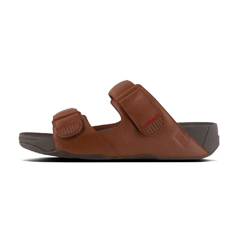 Men's sandals with a flexible sole for easy movementMen's sandals with a flexible sole for easy movementFitFlop Men's Gogh Moc Slide Sandals - Dark Tan Men's sandals with a flexible sole for easy movementMen's sandals with a flexible sole for easy movementFitFlop Men's Gogh Moc Slide Sandals - Dark Tan