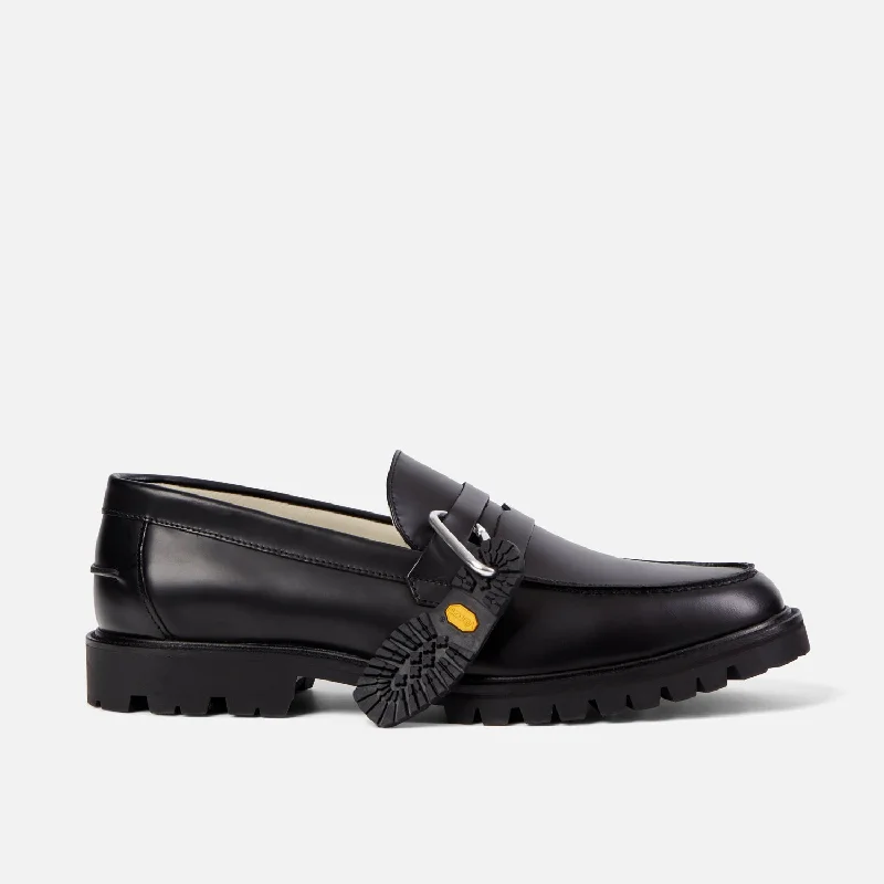 Men's loafers with a contrast stitching detailVibram Black Carrarmato Lug Loafer - Men's Men's loafers with a contrast stitching detailVibram Black Carrarmato Lug Loafer - Men's