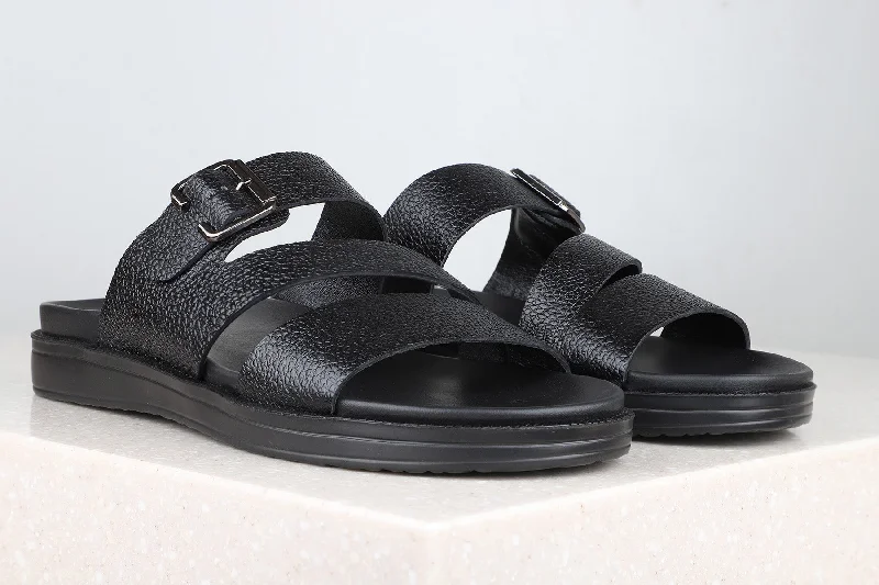 Men's sandals with a decorative buckle or charmMen's sandals with a decorative buckle or charmAtesber Thong Textured Sandal - Black For Men