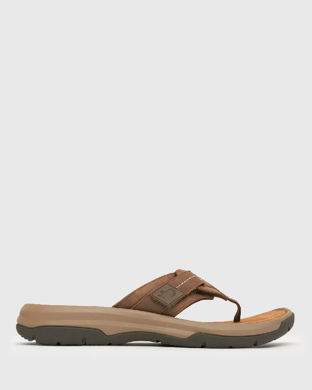 Men's sandals in a neutral color like black or brownMen's sandals in a neutral color like black or brownVICTOR Leather Thong Sandals