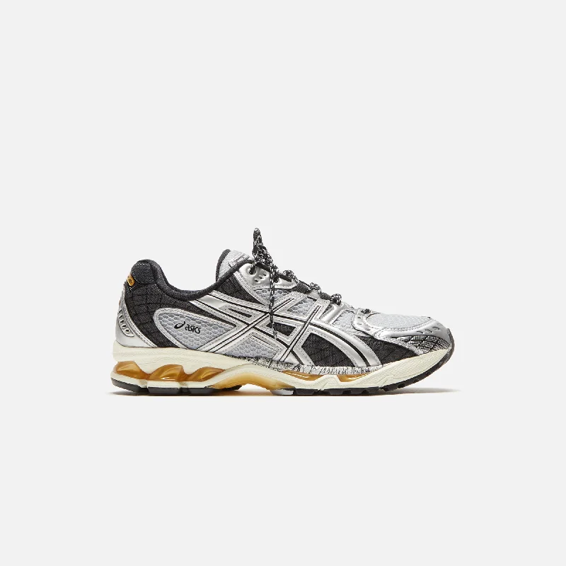 Men's high - performance basketball sneakers with air cushioningASICS Gel-Nimbus 10.1 - Piedmont Grey / Pure Silver Men's high - performance basketball sneakers with air cushioningASICS Gel-Nimbus 10.1 - Piedmont Grey / Pure Silver