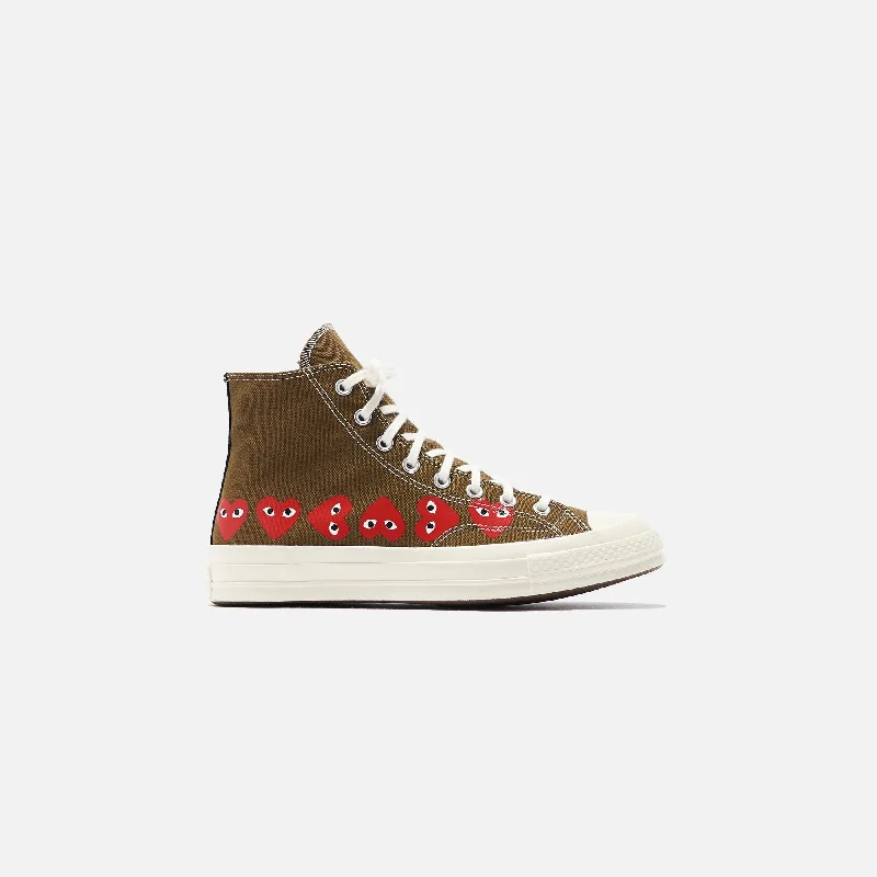 Men's soccer - inspired sneakers with a studded soleConverse x Comme des Garçons CDG Play Chuck Taylor High - Khaki / Multi Heart Men's soccer - inspired sneakers with a studded soleConverse x Comme des Garçons CDG Play Chuck Taylor High - Khaki / Multi Heart