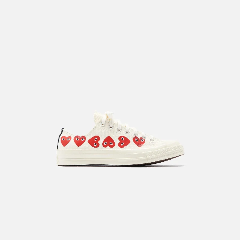 Men's adjustable - strap sneakers for a customized fitConverse x Comme des Garçons CDG Play Chuck Taylor Low - Off White Men's adjustable - strap sneakers for a customized fitConverse x Comme des Garçons CDG Play Chuck Taylor Low - Off White